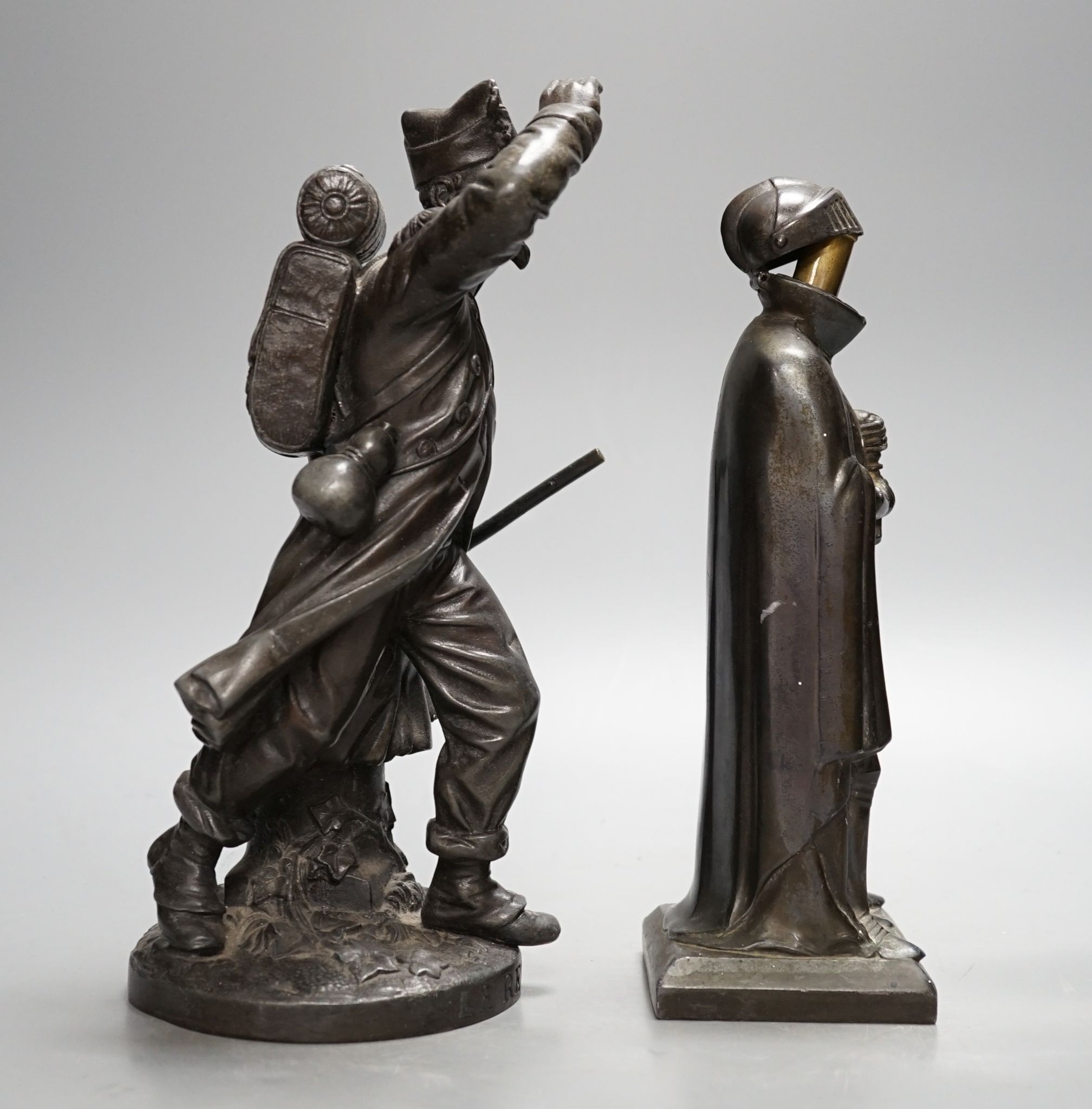 A spelter figure, 'Le Retour' and a similar 'knight' table lighter 27cm